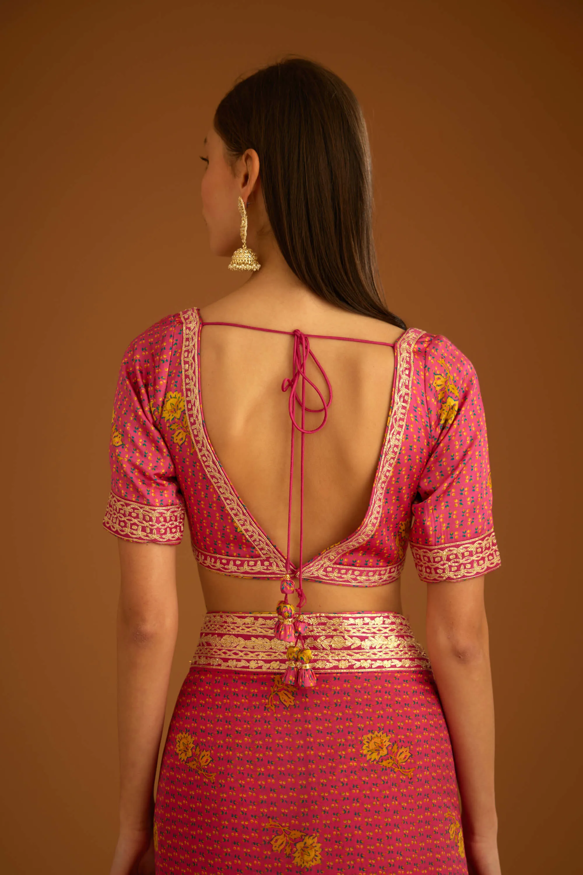 Fuschia pink printed sari and blouse