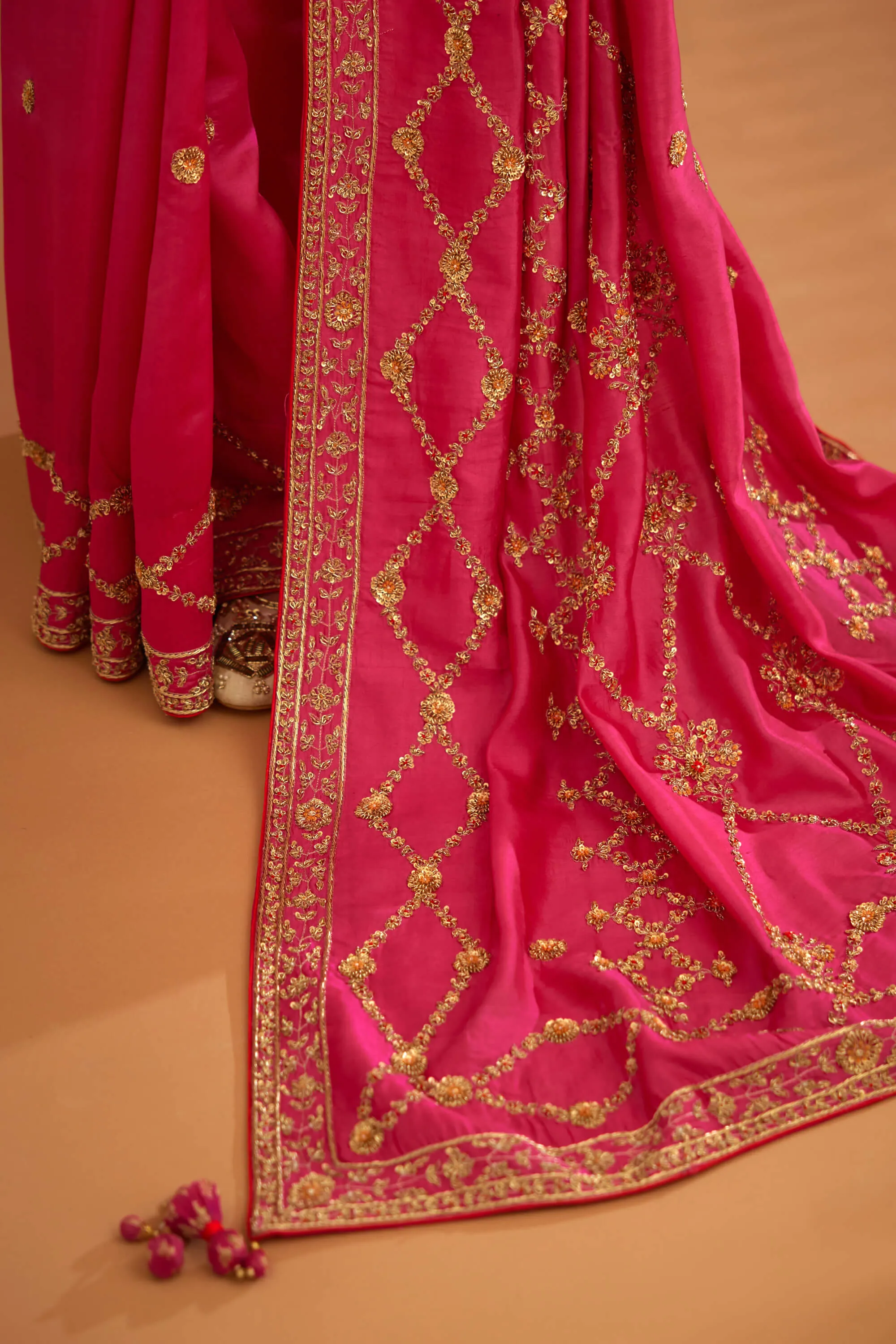 Fuschia pink zardozi sari and blouse