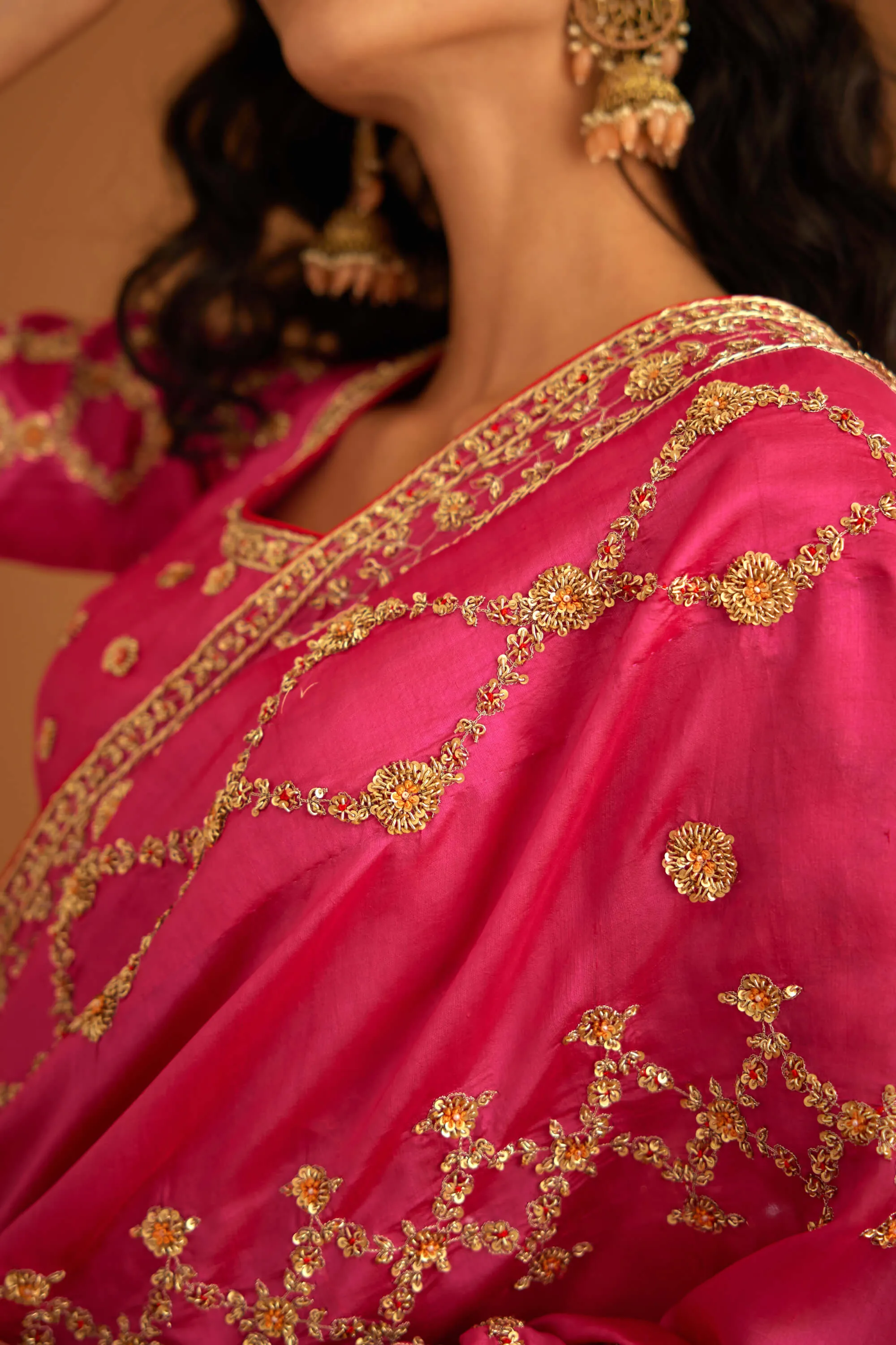 Fuschia pink zardozi sari and blouse