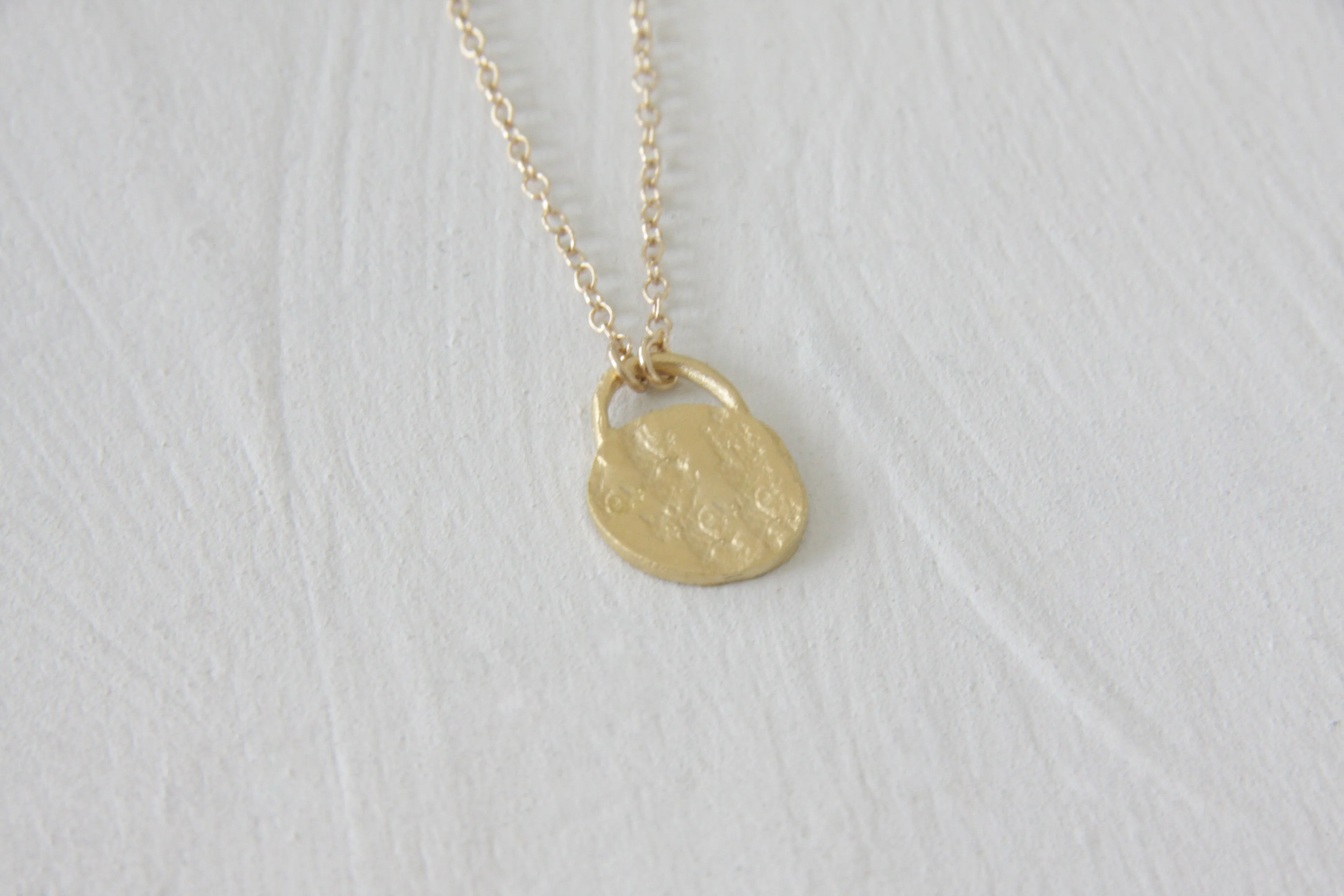 Gold Organic Round lock Pendant