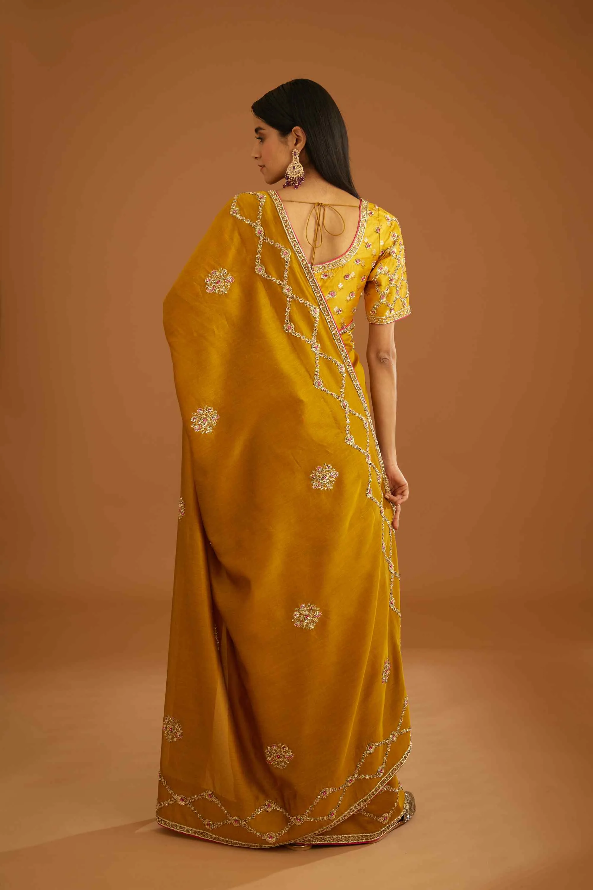 Mustard yellow zardozi sari and blouse
