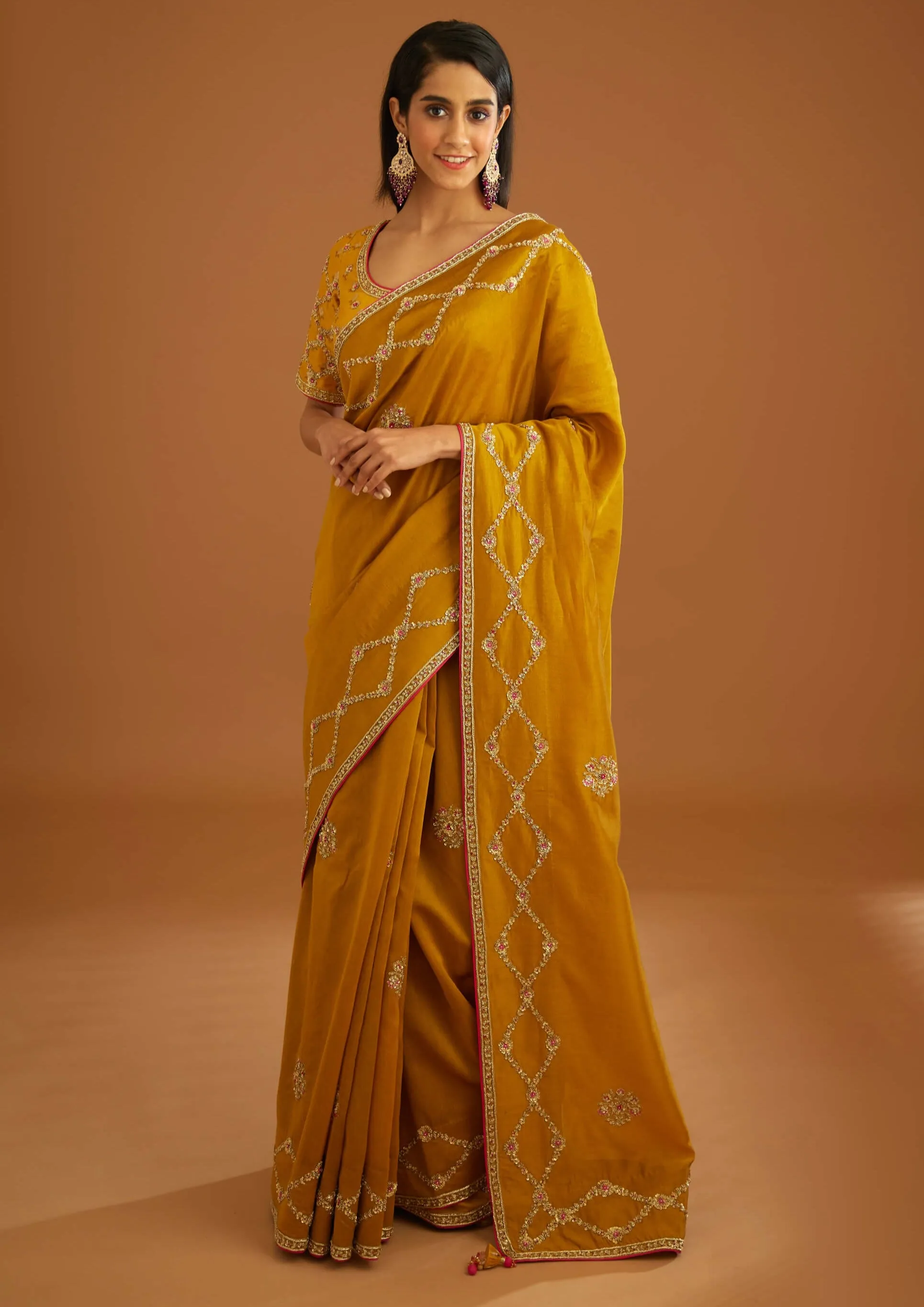 Mustard yellow zardozi sari and blouse
